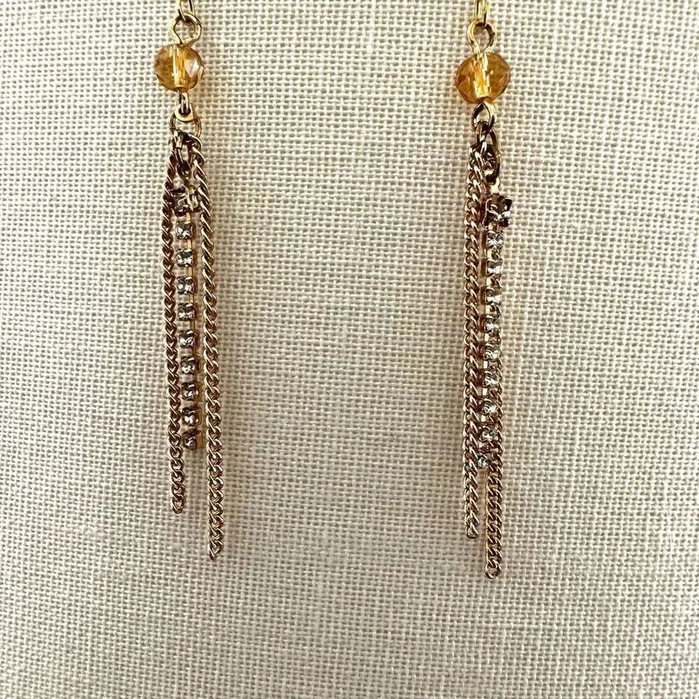 Gold tone long chain rhinestone earrings